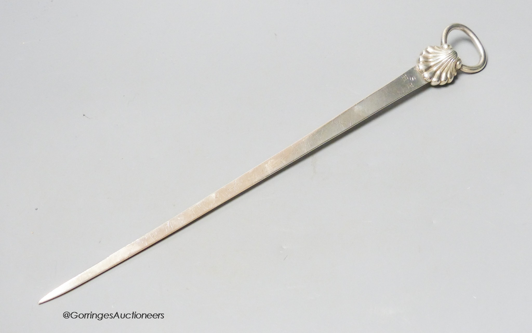 A late George II silver meat skewer, with shell terminal, Samuel Courthauld, London, 1759, 32.7cm, 4oz.